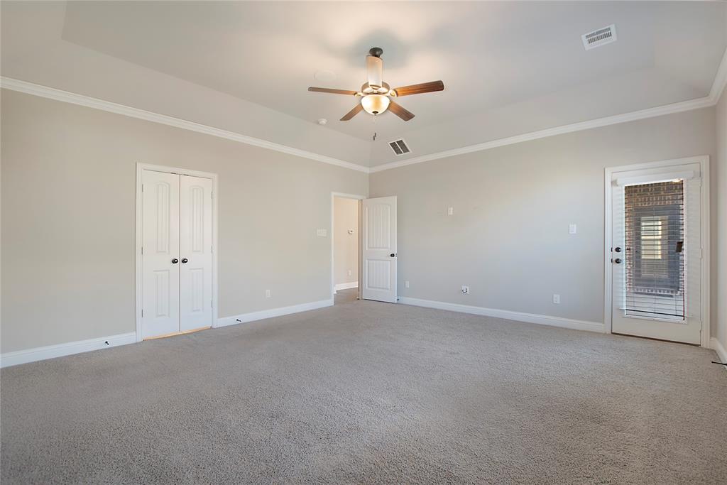 2811 Diamond Ridge Drive Arlington, TX 76001 - Photo 24 of 35 a view of an empty room with a ceiling fan