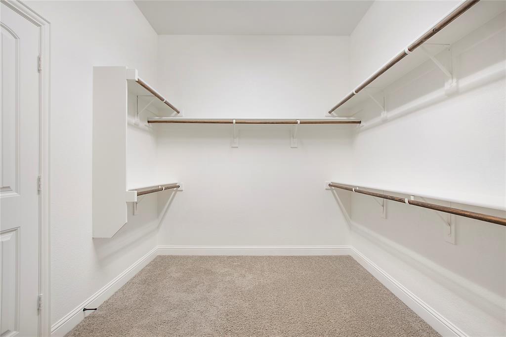 2811 Diamond Ridge Drive Arlington, TX 76001 - Photo 28 of 35 a view of an empty walk in closet