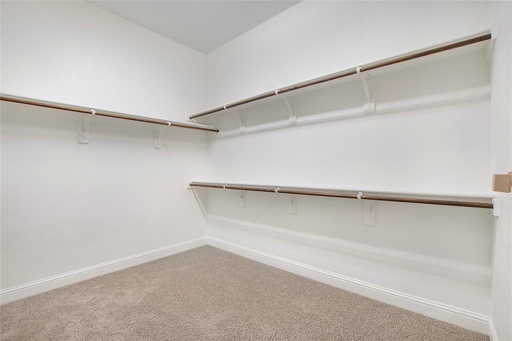 2811 Diamond Ridge Drive Arlington, TX 76001 - Photo 29 of 35 a view of an empty walk in closet