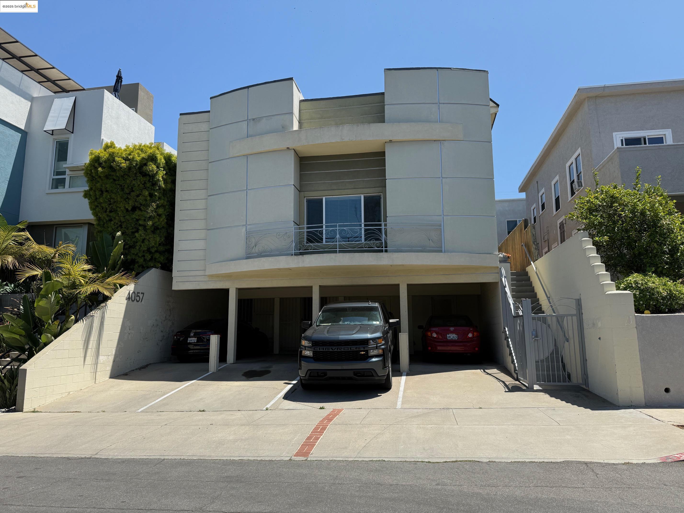 4057 Brant Street, Unit 8 San Diego, CA 92103 - Photo 1 of 17 a front view of a house with car parked
