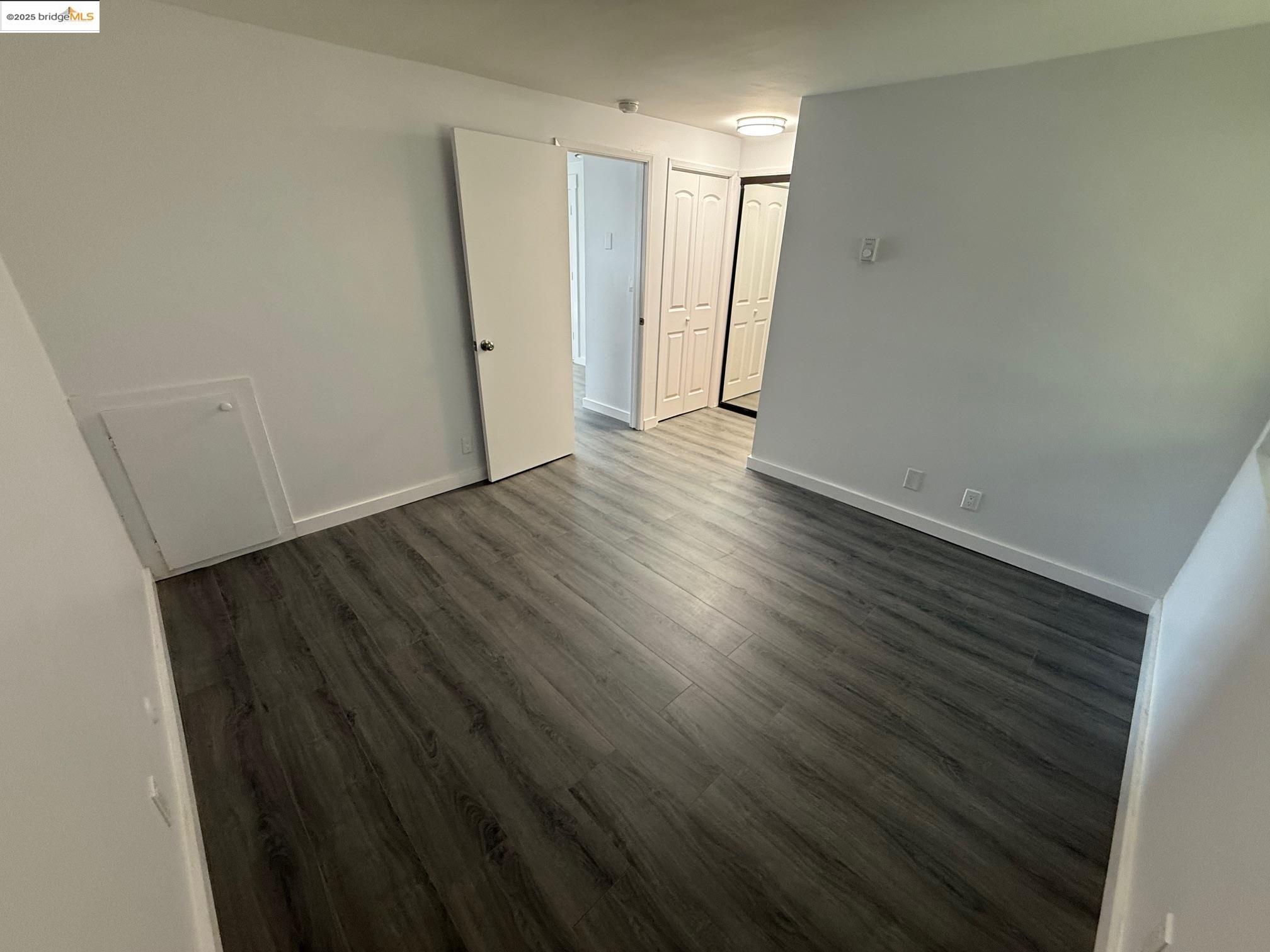 4057 Brant Street, Unit 8 San Diego, CA 92103 - Photo 10 of 17 a view of hallway with wooden floor