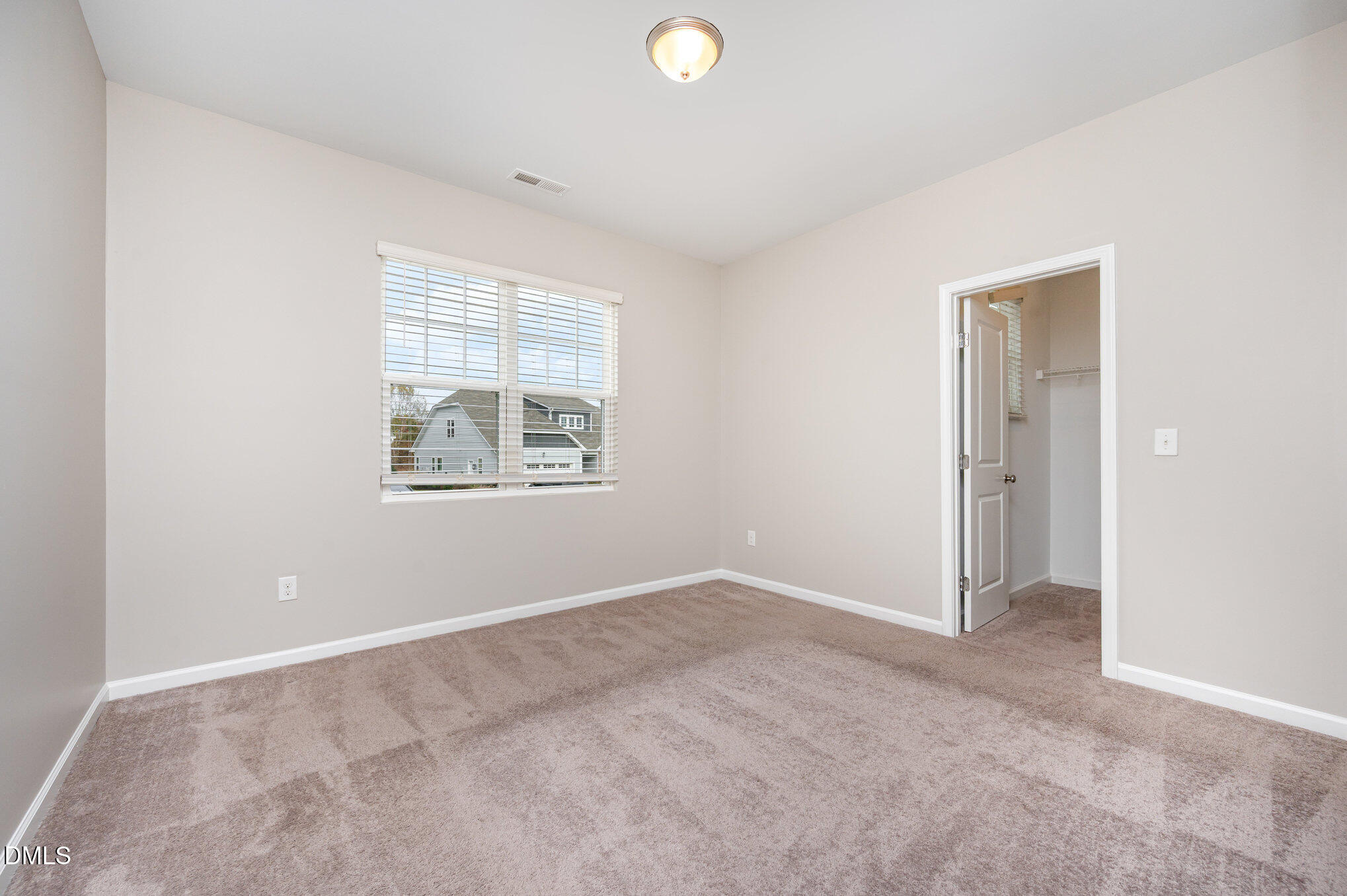 18 Dover Ridge Court Chapel Hill, NC 27517 - Photo 28 of 40 an empty room with windows and closet
