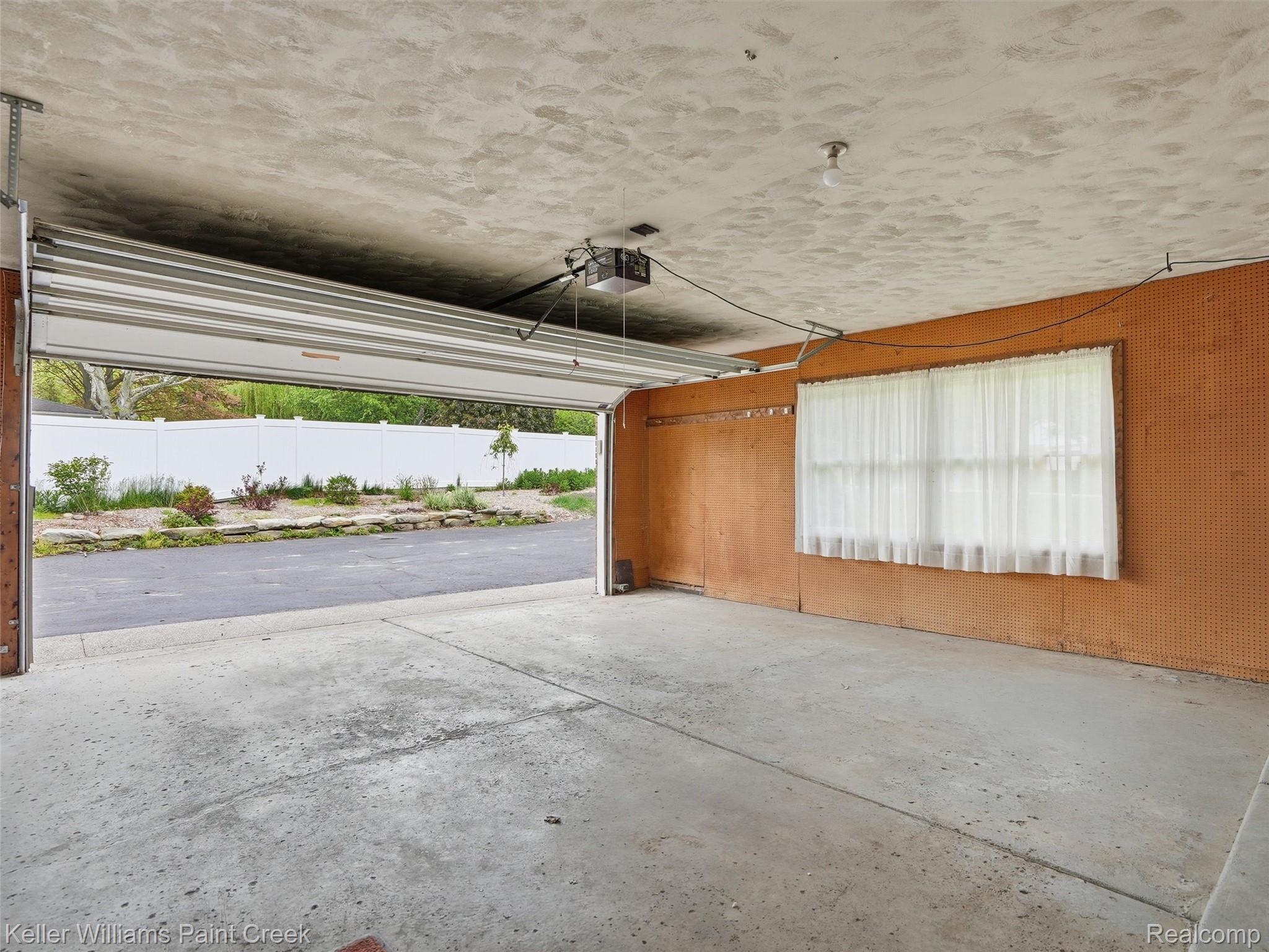 436 Broadleaf Drive Rochester, MI 48306 - Photo 39 of 41 Garage with a garage door opener
