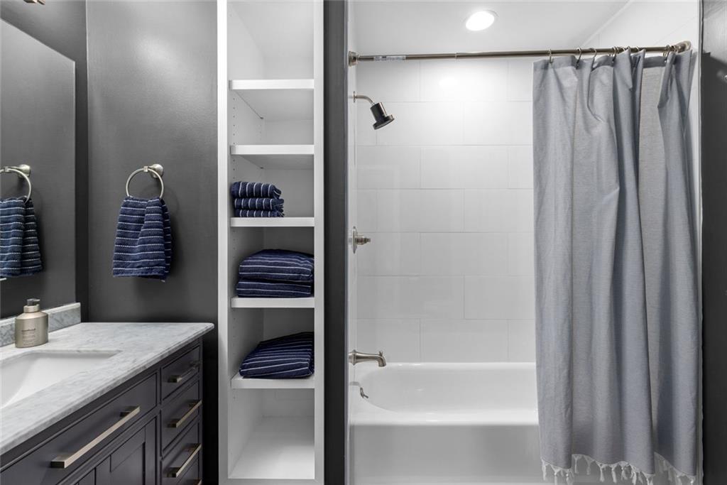1601 Defoors Landing Northwest Atlanta, GA 30318 - Photo 42 of 48 a bathroom with a shower and a sink