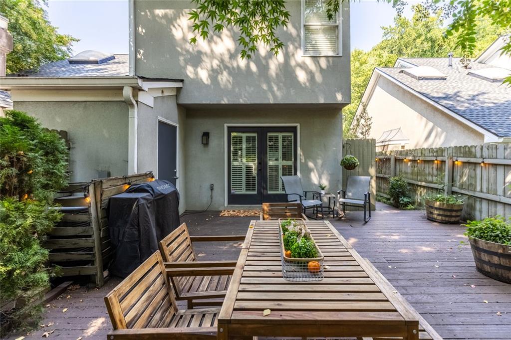 1601 Defoors Landing Northwest Atlanta, GA 30318 - Photo 45 of 48 a view of a patio with chairs and potted plants