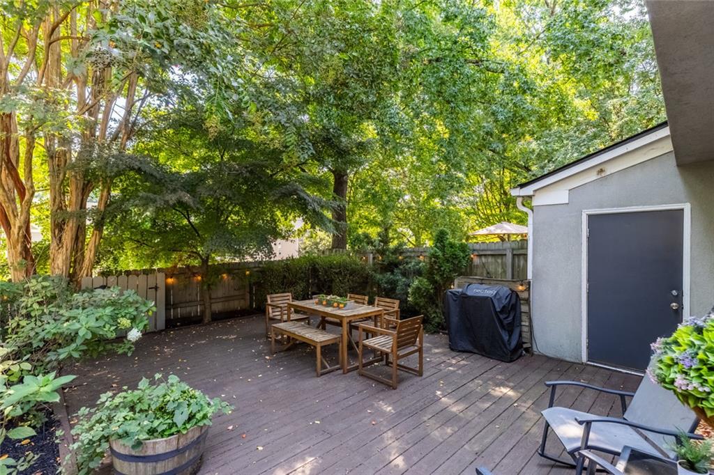 1601 Defoors Landing Northwest Atlanta, GA 30318 - Photo 48 of 48 a view of a backyard with sitting area and garden