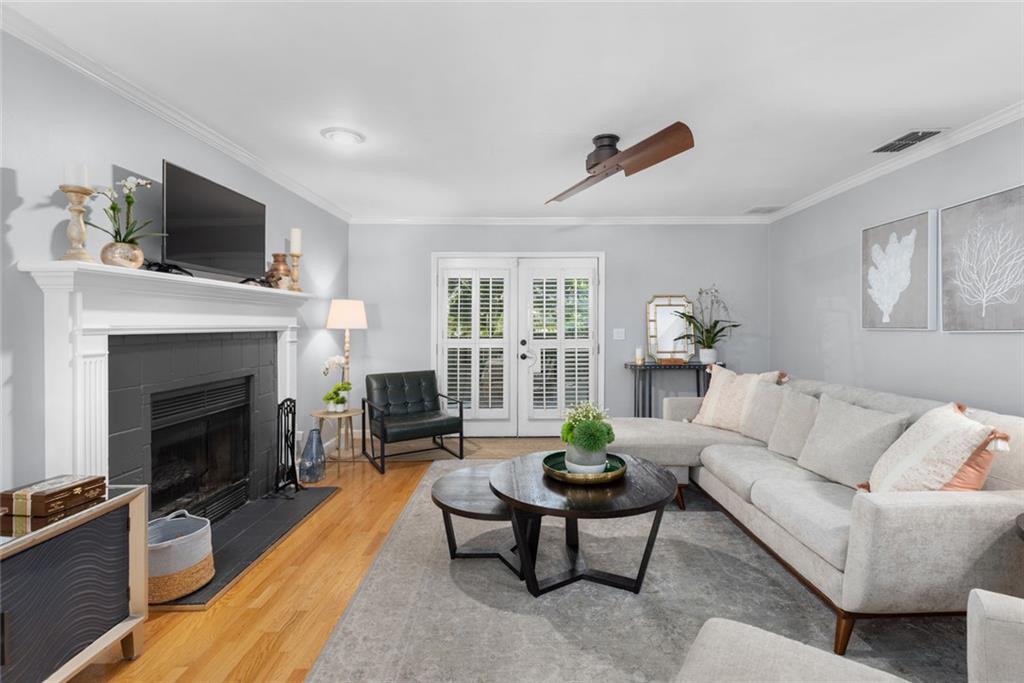1601 Defoors Landing Northwest Atlanta, GA 30318 - Photo 10 of 48 a living room with furniture and a fireplace