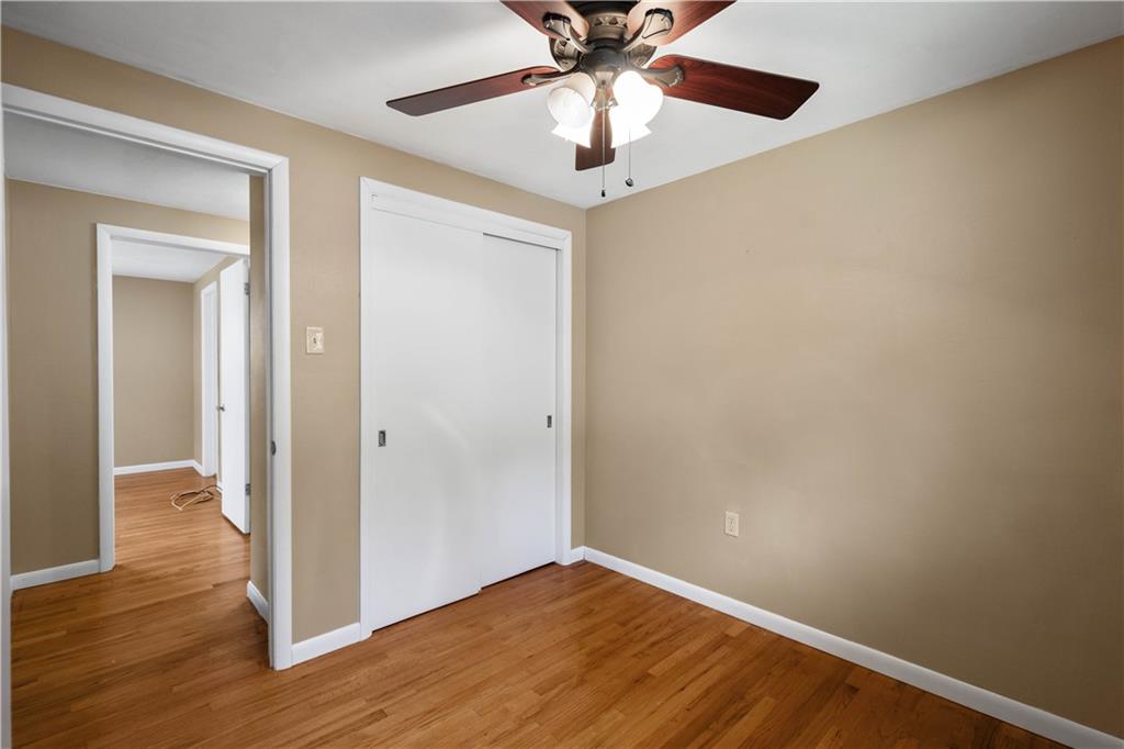 127 George Street Turtle Creek, PA 15145 - Photo 14 of 34 a view of an empty room with wooden floor