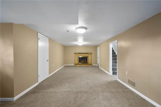 a view of a livingroom with a staircase
