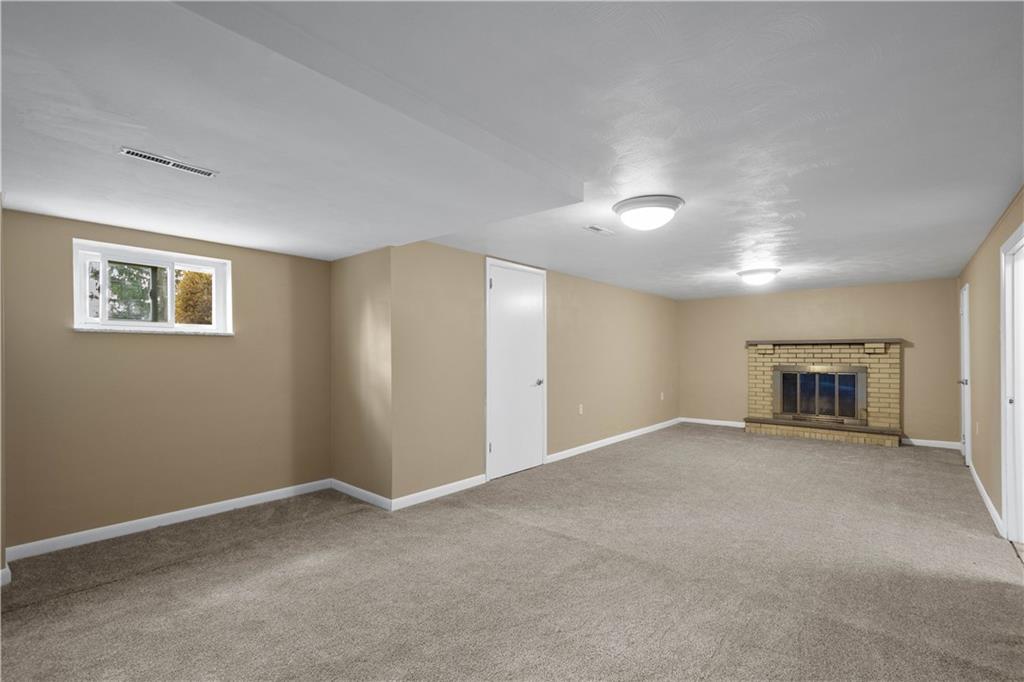 127 George Street Turtle Creek, PA 15145 - Photo 21 of 34 a view of empty room with a fireplace