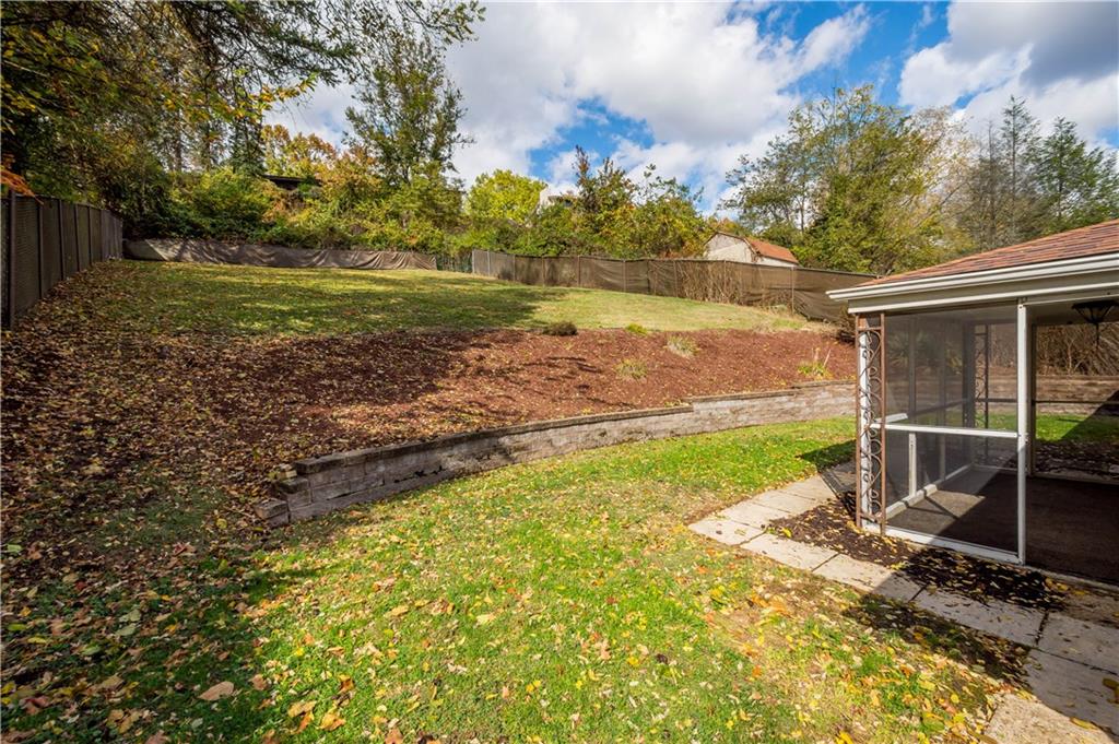 127 George Street Turtle Creek, PA 15145 - Photo 30 of 34 a view of a backyard with a garden and entertaining space