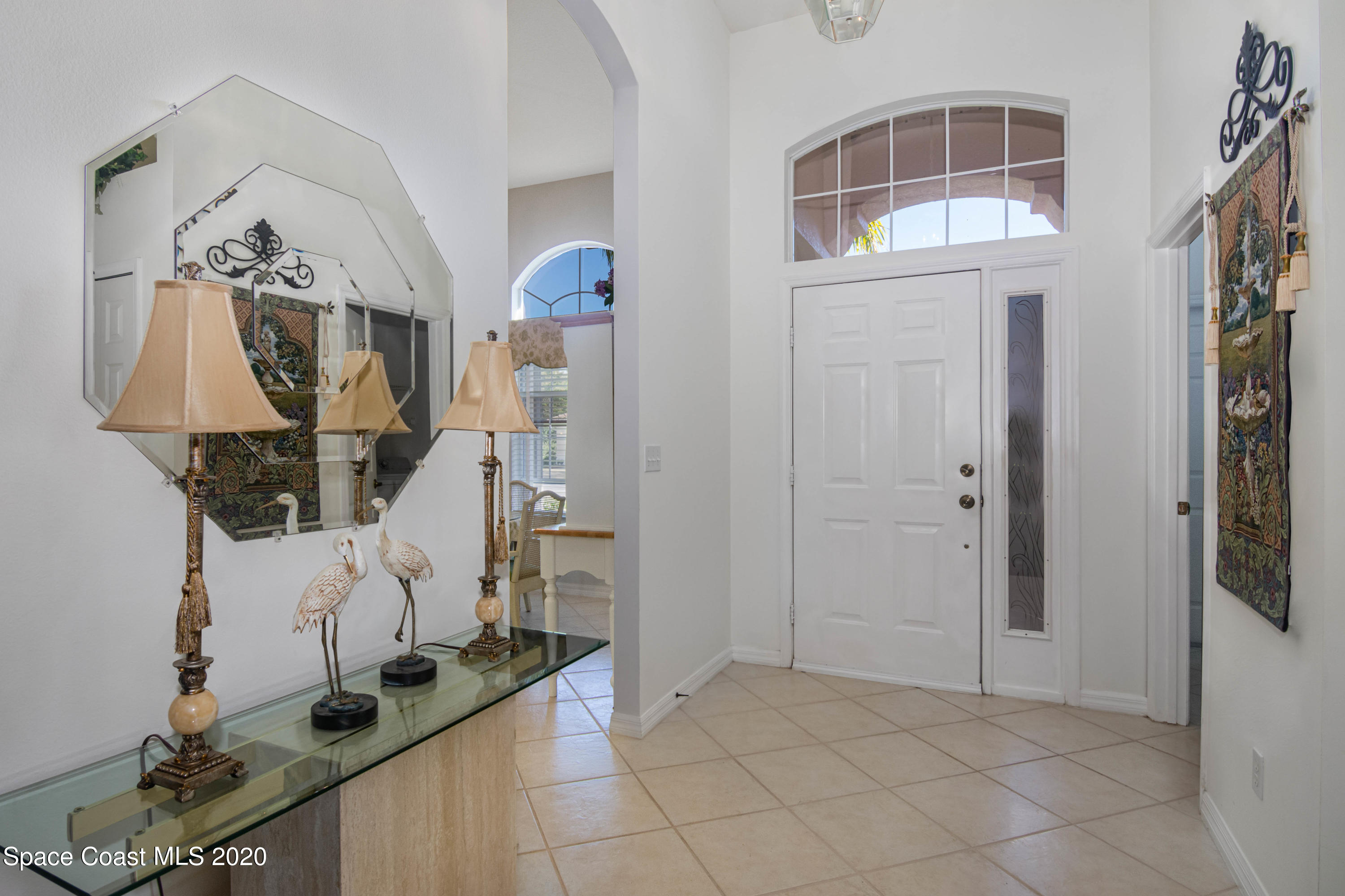 421 Shell Cove Drive Melbourne, FL 32940 - Photo 18 of 23 a view of living room with furniture and cabinets