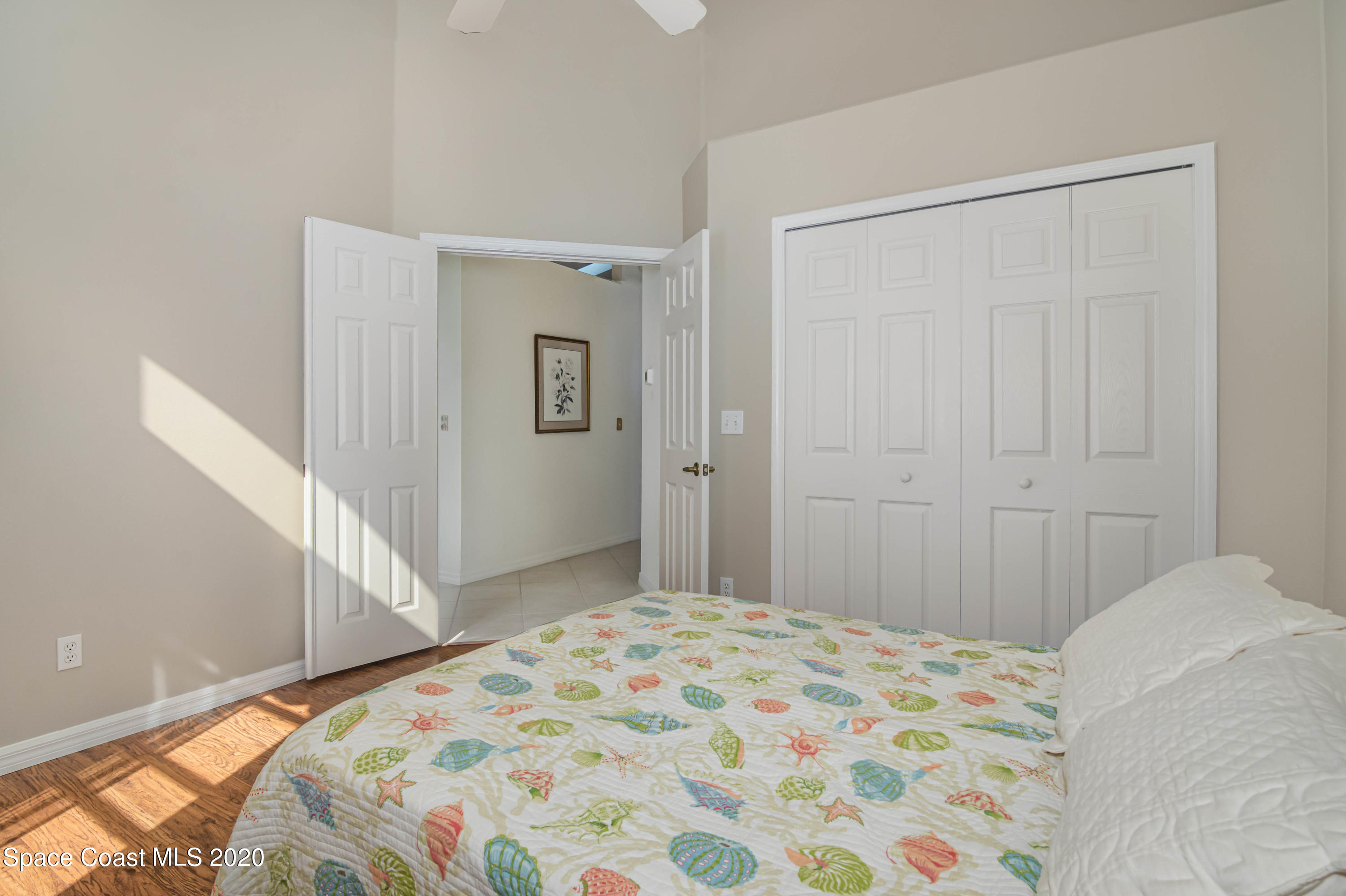 421 Shell Cove Drive Melbourne, FL 32940 - Photo 23 of 23 a bedroom with a bed and a window