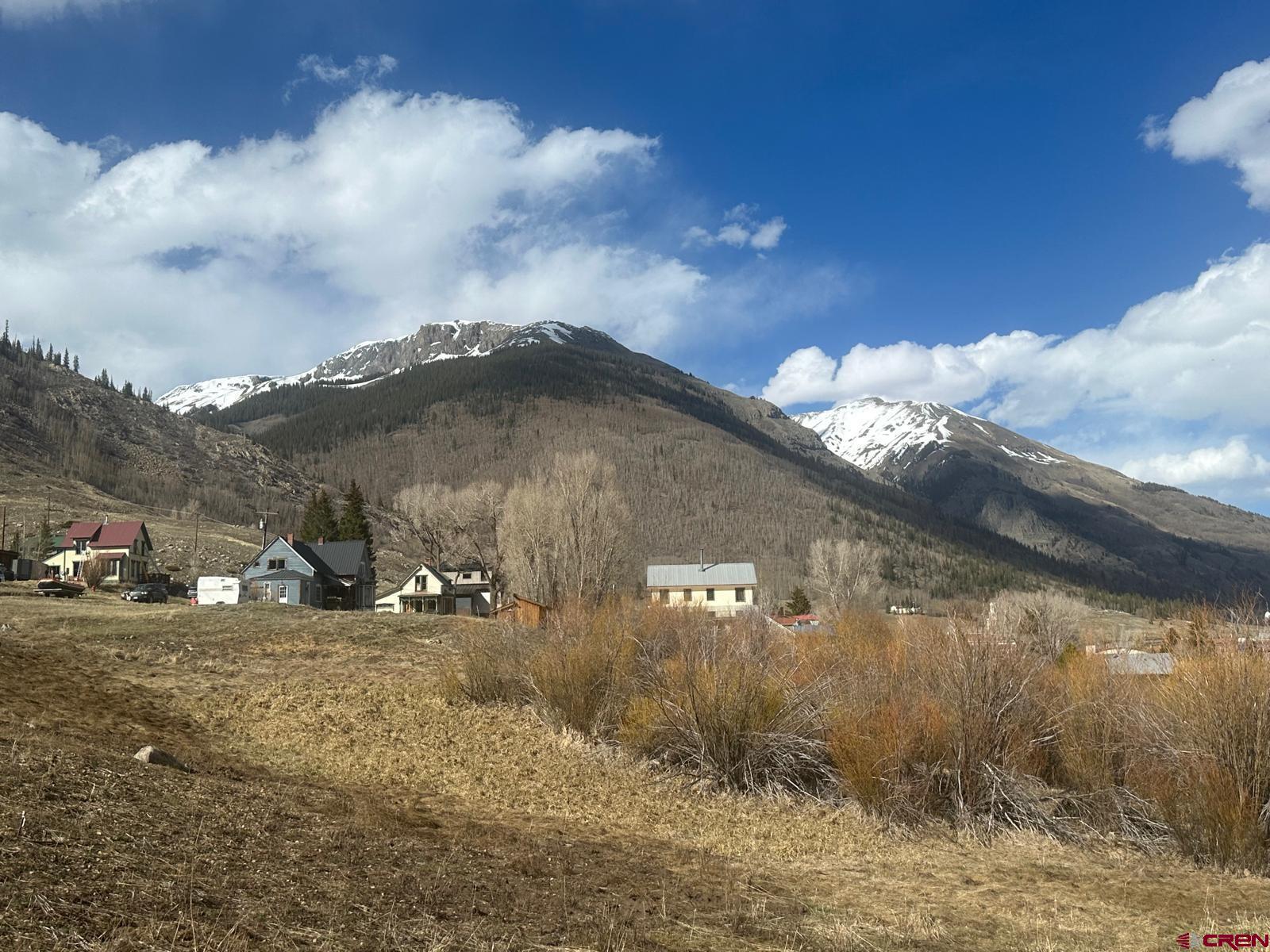 8-th & Snowden Street Silverton, CO 81433 - Photo 4 of 5 a view of a yard with wooden fence