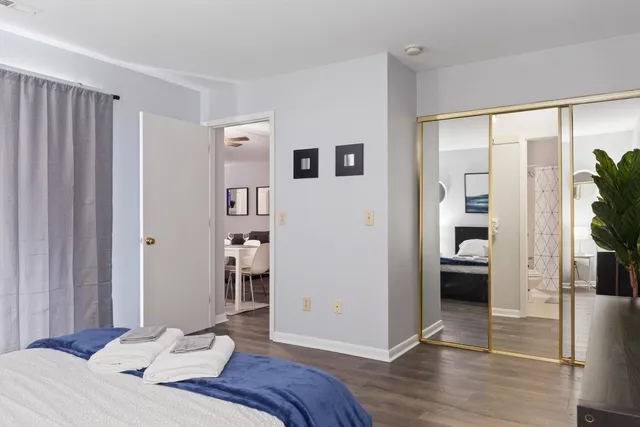 a bedroom with a bed and a view of bedroom