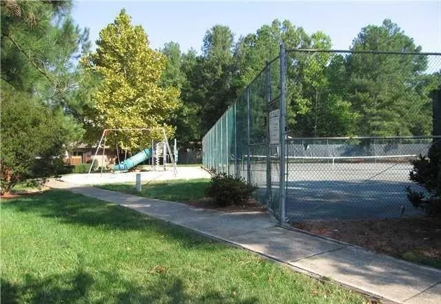 a view of backyard with green space