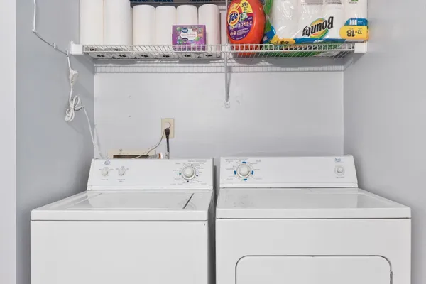 a utility room with dryer and washer