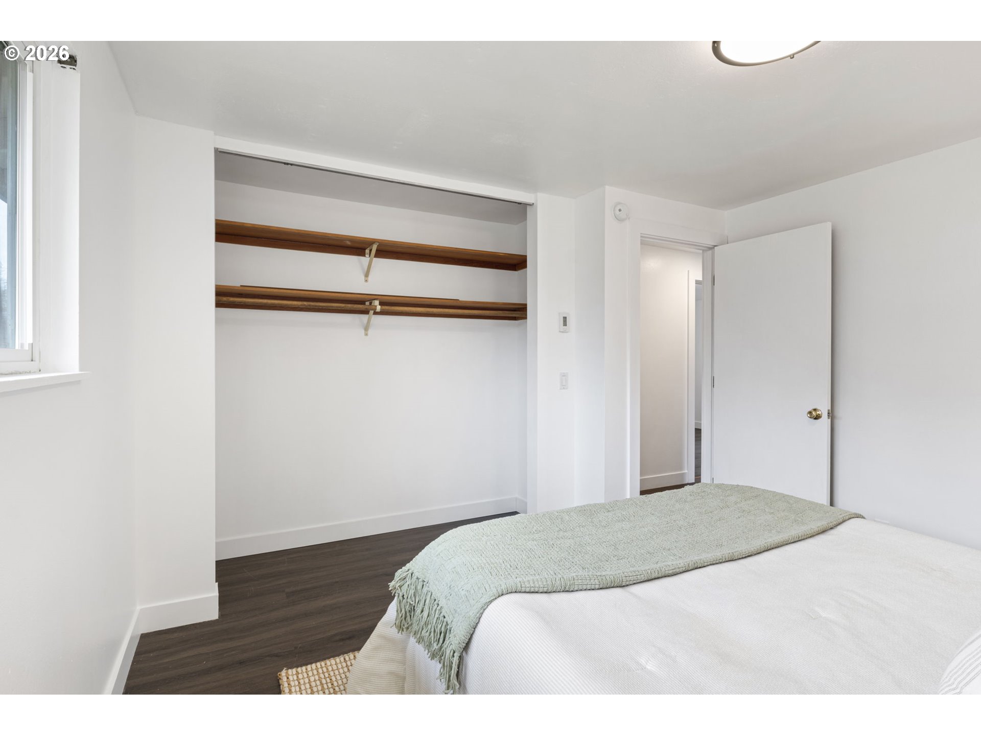 1885 Churchill Street Eugene, OR 97405 - Photo 22 of 45 a bedroom with a bed and a wall painting