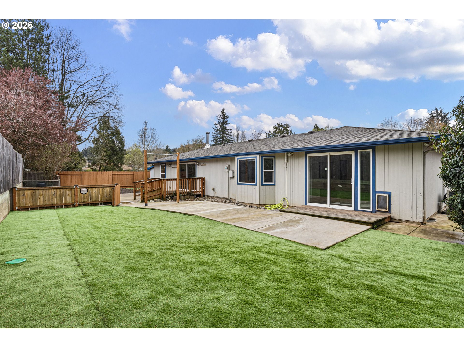 1885 Churchill Street Eugene, OR 97405 - Photo 33 of 45 a view of a house with a yard and sitting area