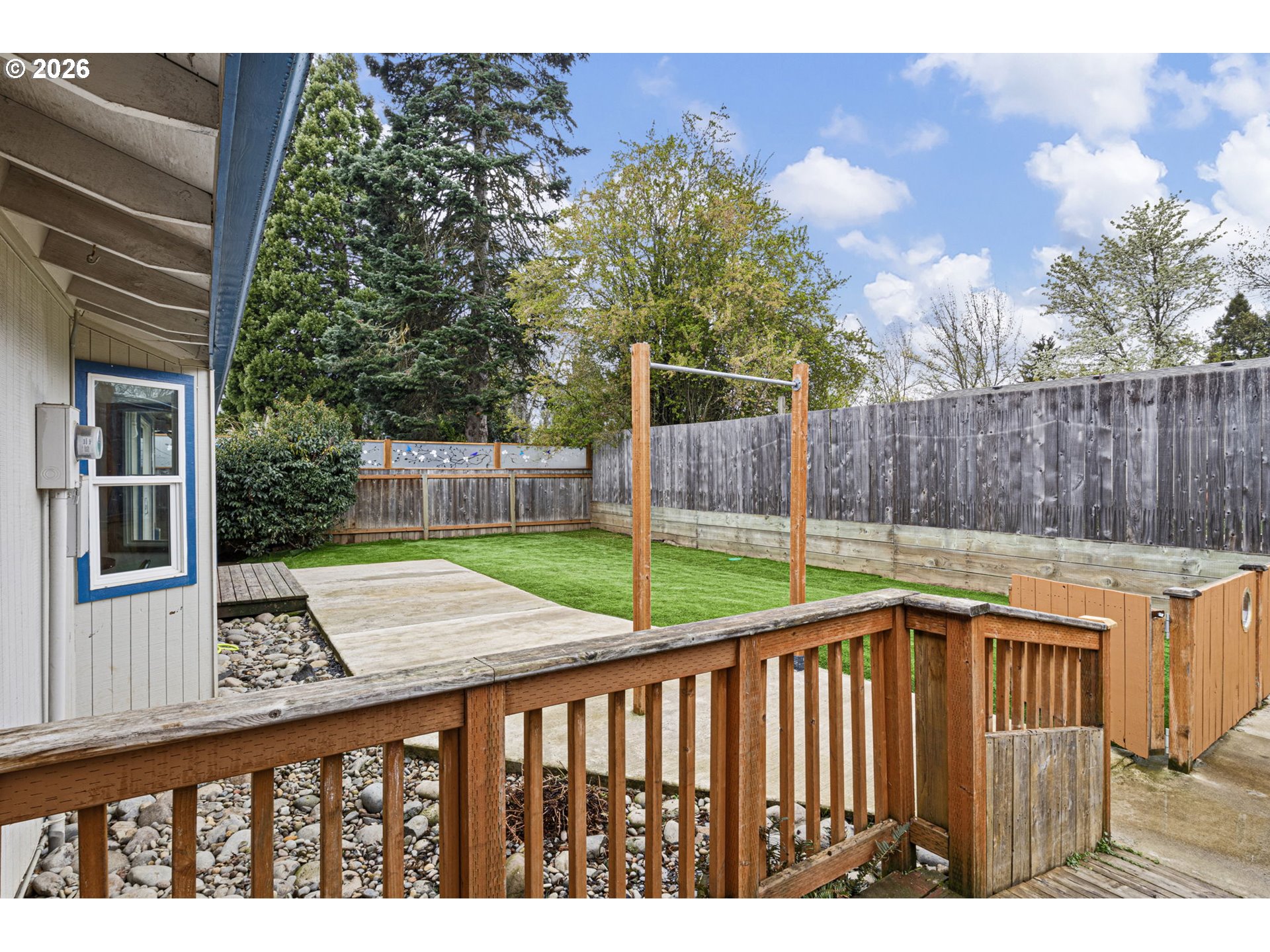 1885 Churchill Street Eugene, OR 97405 - Photo 36 of 45 a view of a wooden deck with a yard