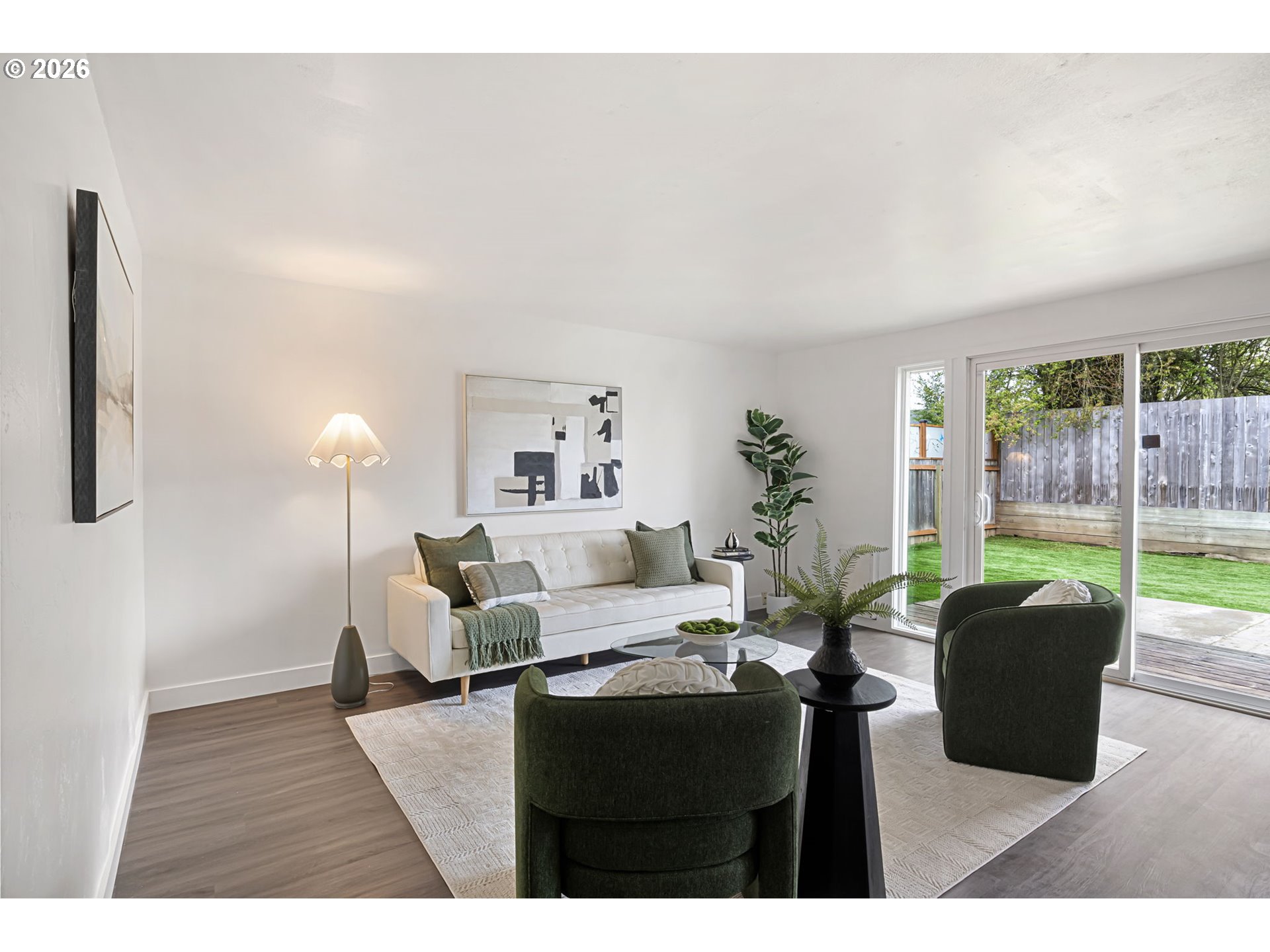1885 Churchill Street Eugene, OR 97405 - Photo 4 of 45 a living room with furniture a large window and a wooden floor