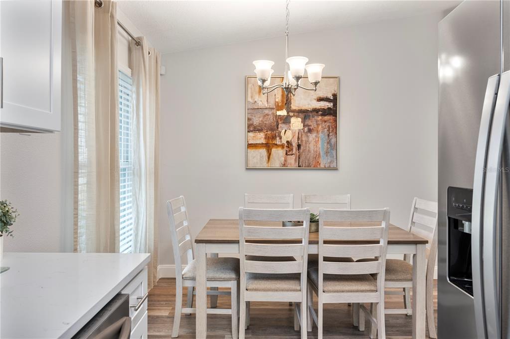 1106 Lakewood Road Lakeland, FL 33805 - Photo 9 of 27 a dining room with furniture and window