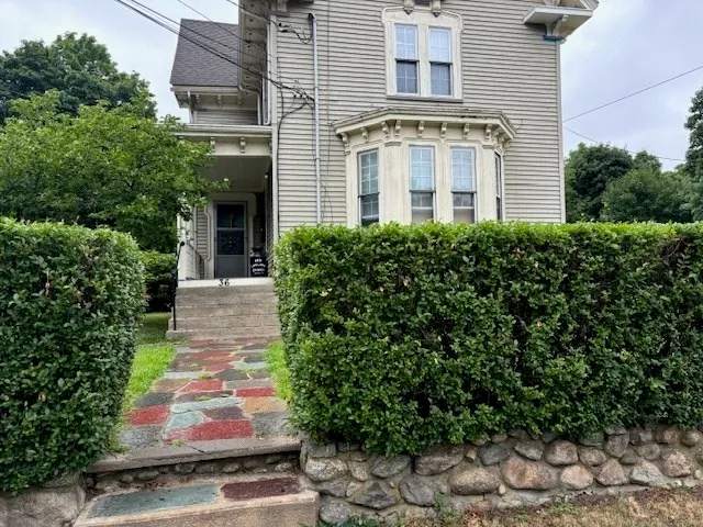 a front view of a multi story residential apartment building