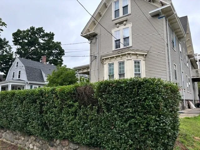a front view of a multi story residential apartment building