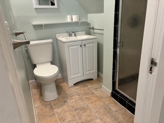 36 School Street, Unit 3 Woburn, MA 01801 - Photo 7 of 8 a bathroom with a sink and a toilet