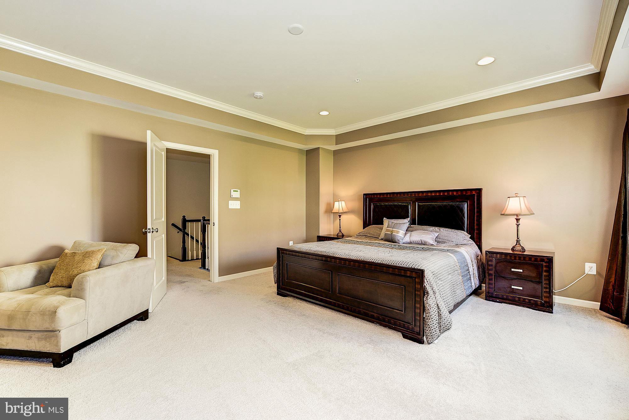 1525 Rabbit Hollow Place Silver Spring, MD 20906 - Photo 15 of 30 a bedroom with a bed and lamp