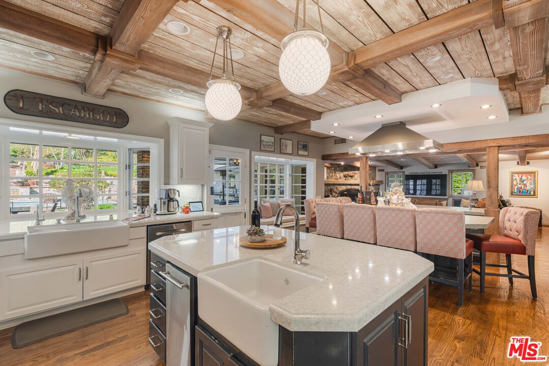 23939 Long Valley Road Hidden Hills, CA 91302 - Photo 27 of 61 a room with stainless steel appliances lots of counter space