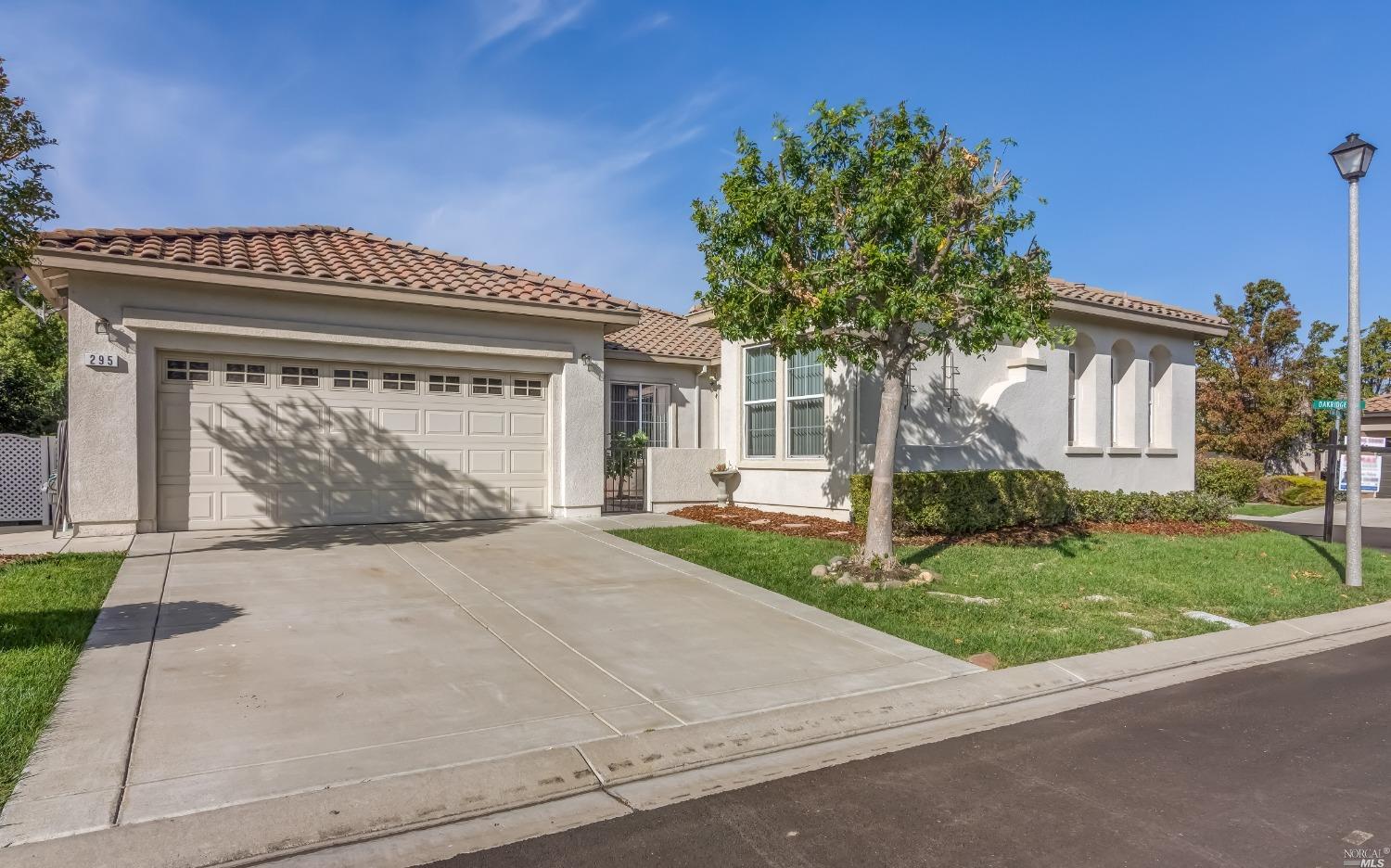 295 Sage Meadows Drive Rio Vista, CA 94571 - Photo 1 of 1 a front view of a house with a yard and garage