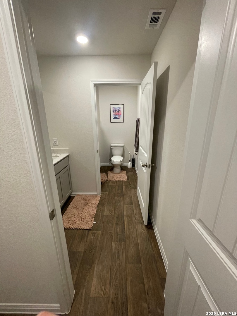 226 Evergreen Sumac Loop Kyle, TX 78640 - Photo 33 of 37 a view of a hallway and a livingroom with furniture