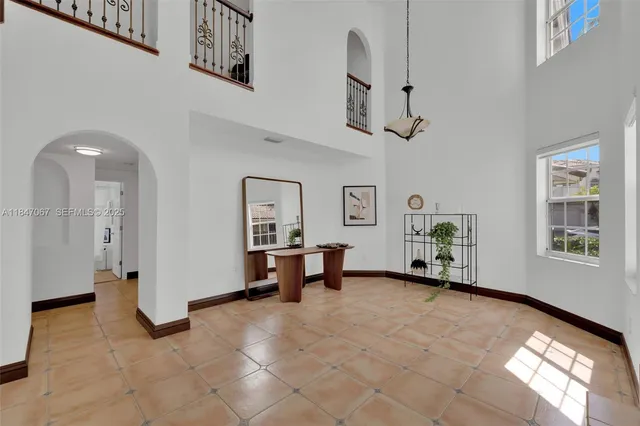 a view of a livingroom with furniture and window