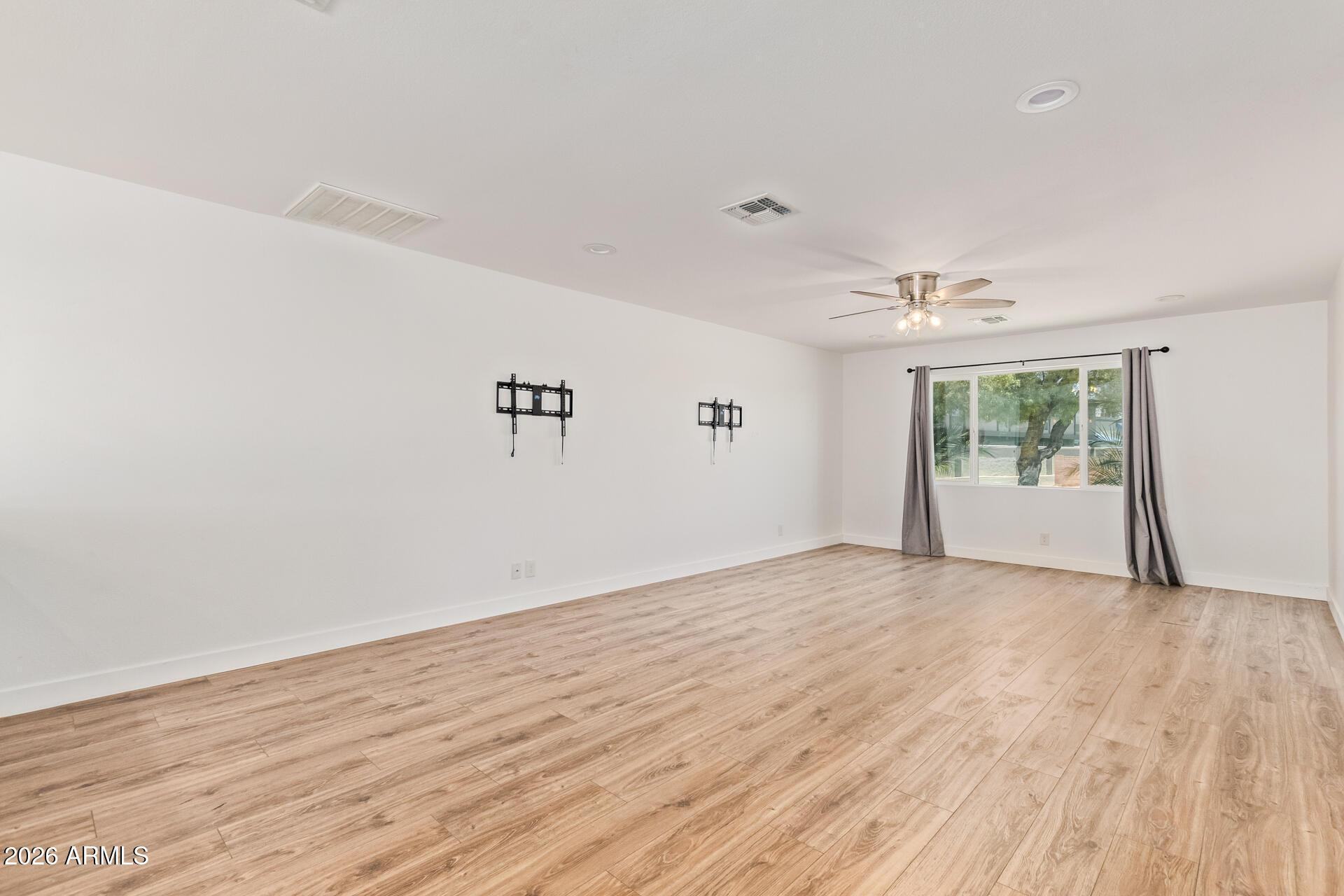 1809 East Concorda Drive Tempe, AZ 85282 - Photo 2 of 23 wooden floor in an empty room