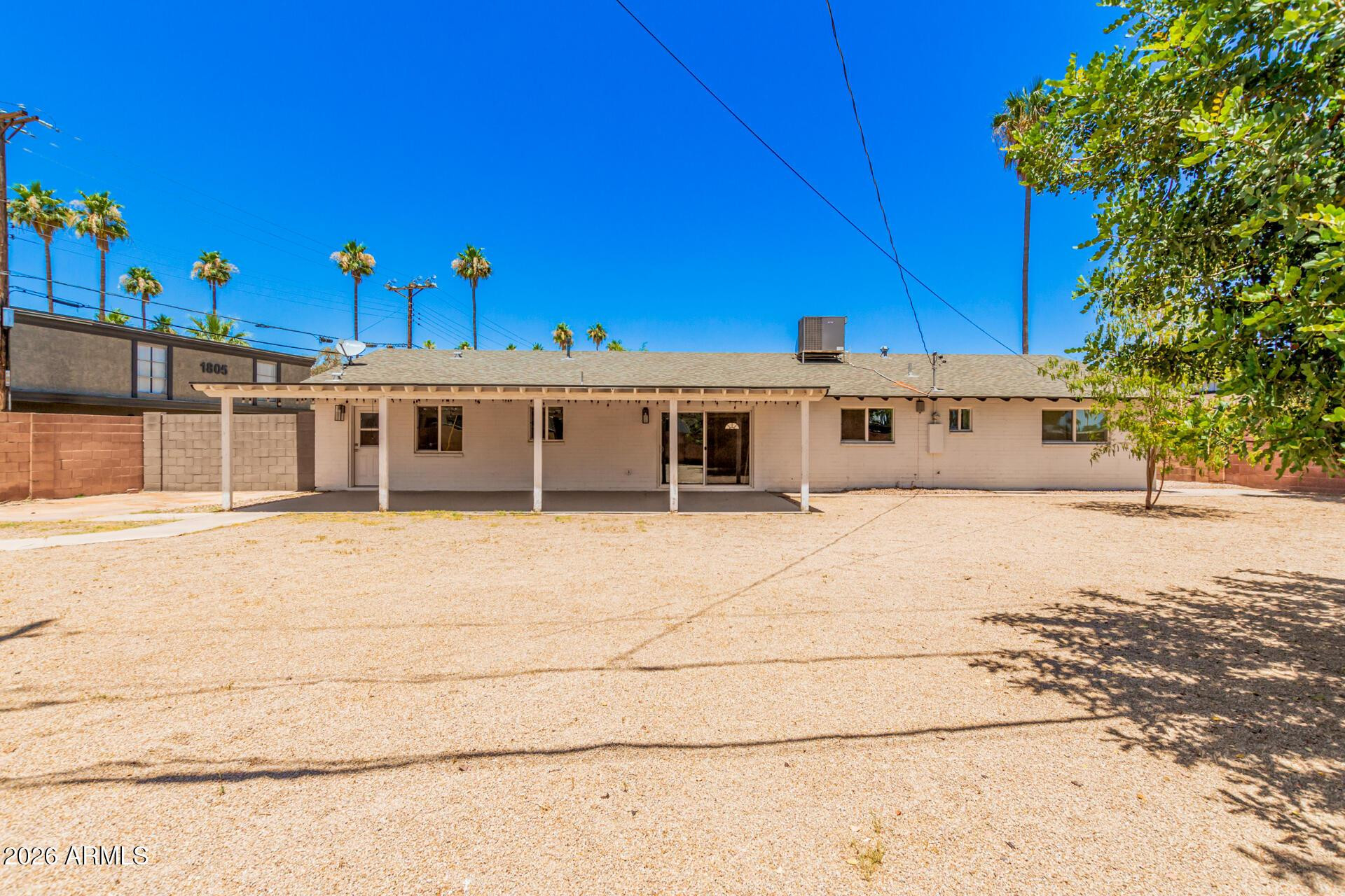 1809 East Concorda Drive Tempe, AZ 85282 - Photo 23 of 23 a view of a house with a large trees