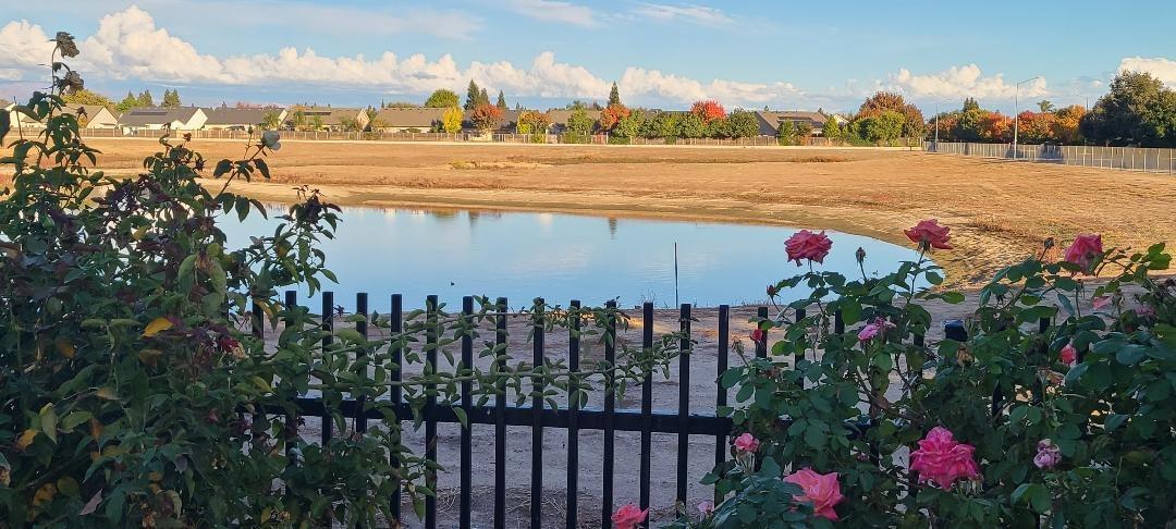 1611 North Monaco Lane Clovis, CA 93619 - Photo 15 of 16 a view of a lake