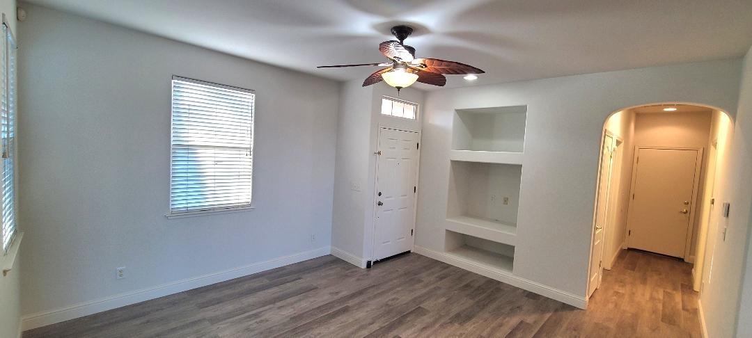 1611 North Monaco Lane Clovis, CA 93619 - Photo 6 of 16 a view of a livingroom with a chandelier