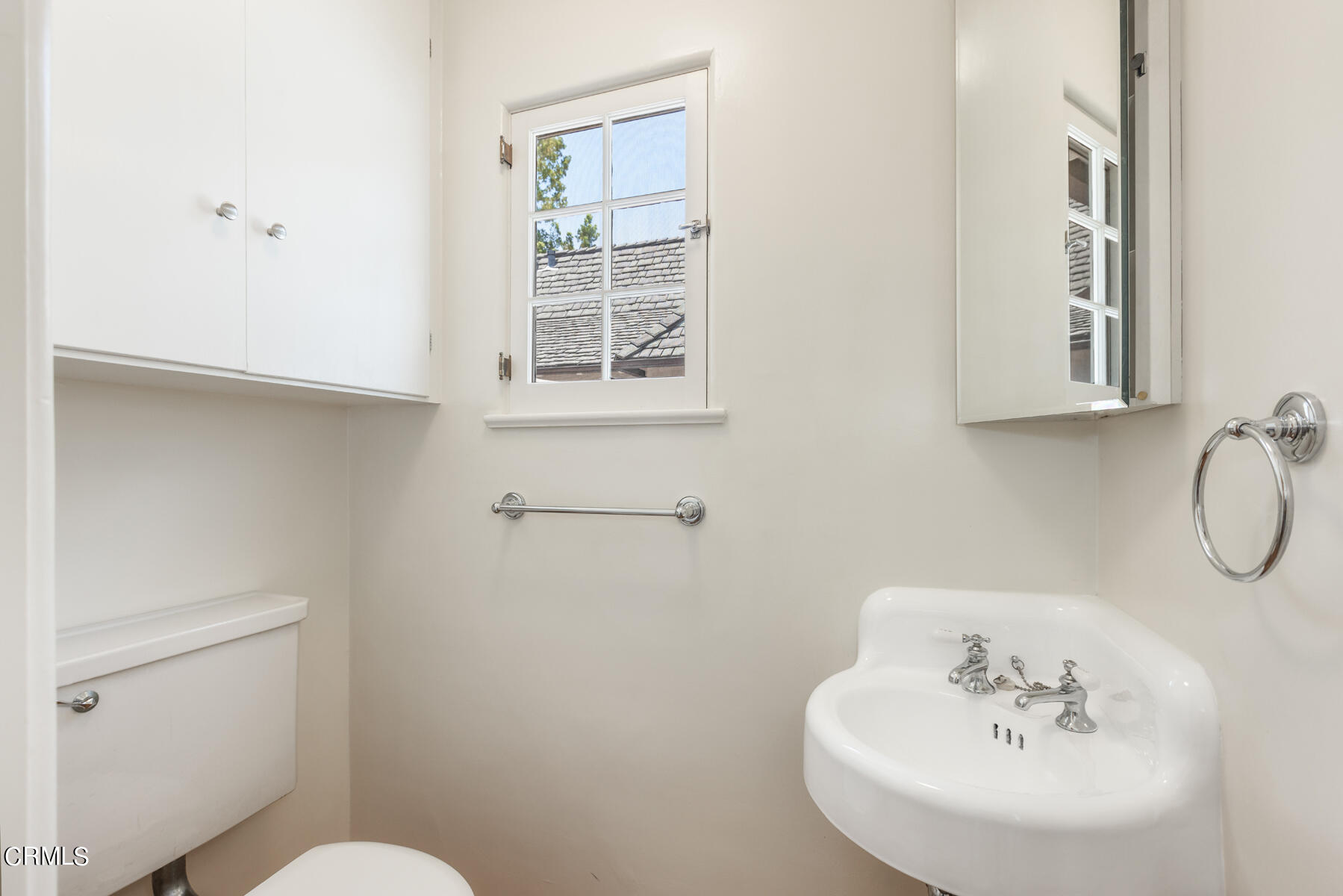 369 West Kenneth Road Glendale, CA 91202 - Photo 27 of 45 a bathroom with a sink and a toilet