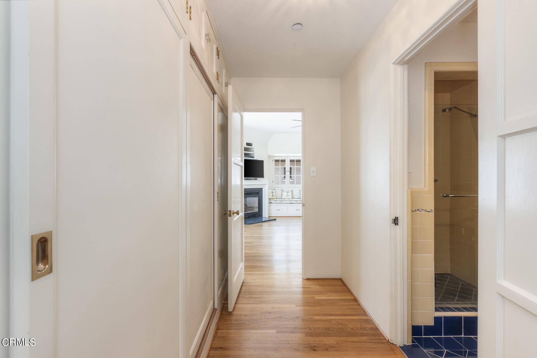 369 West Kenneth Road Glendale, CA 91202 - Photo 32 of 45 a view of a hallway with wooden floor and a bathroom