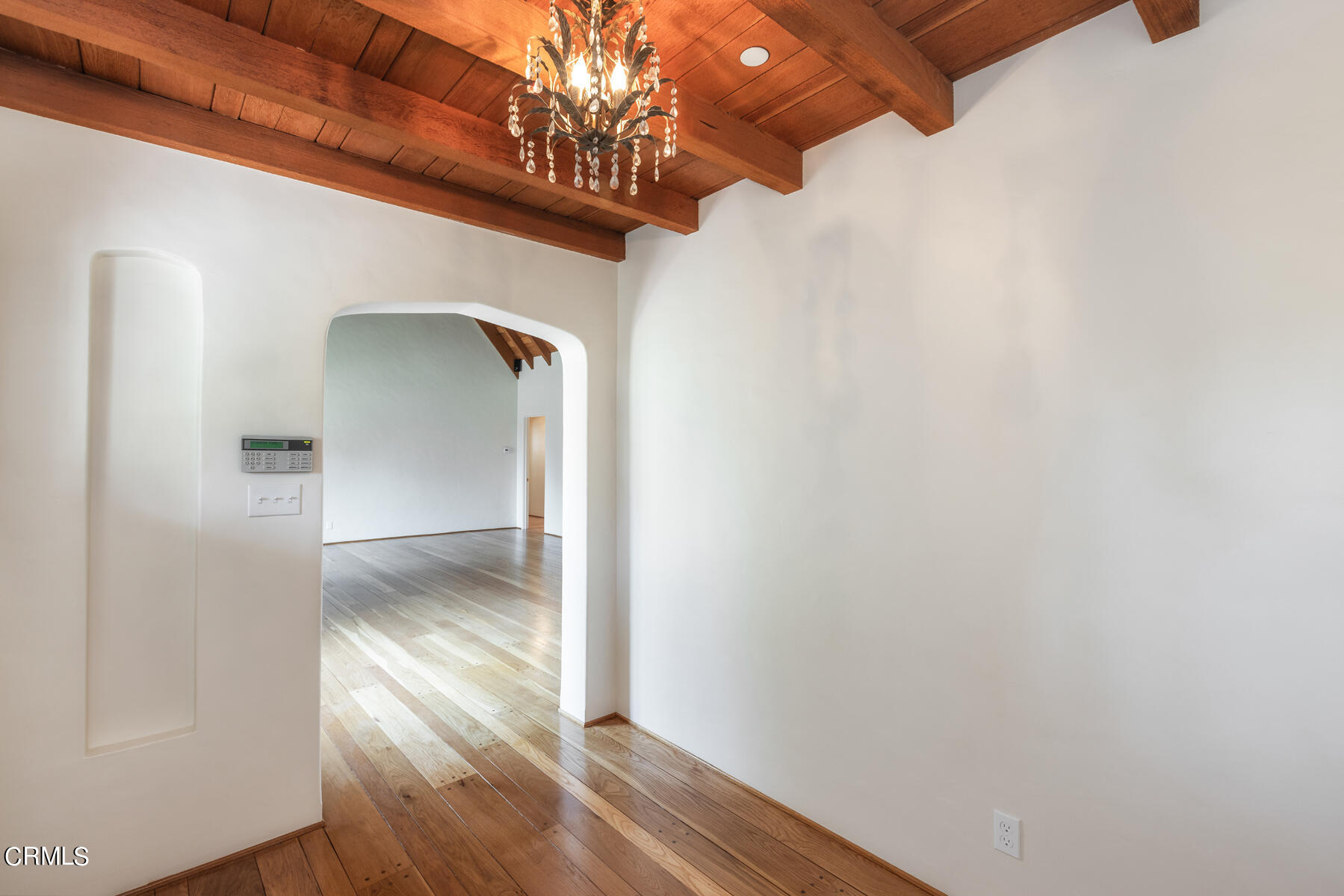 369 West Kenneth Road Glendale, CA 91202 - Photo 7 of 45 a view of a hallway with wooden floor and staircase