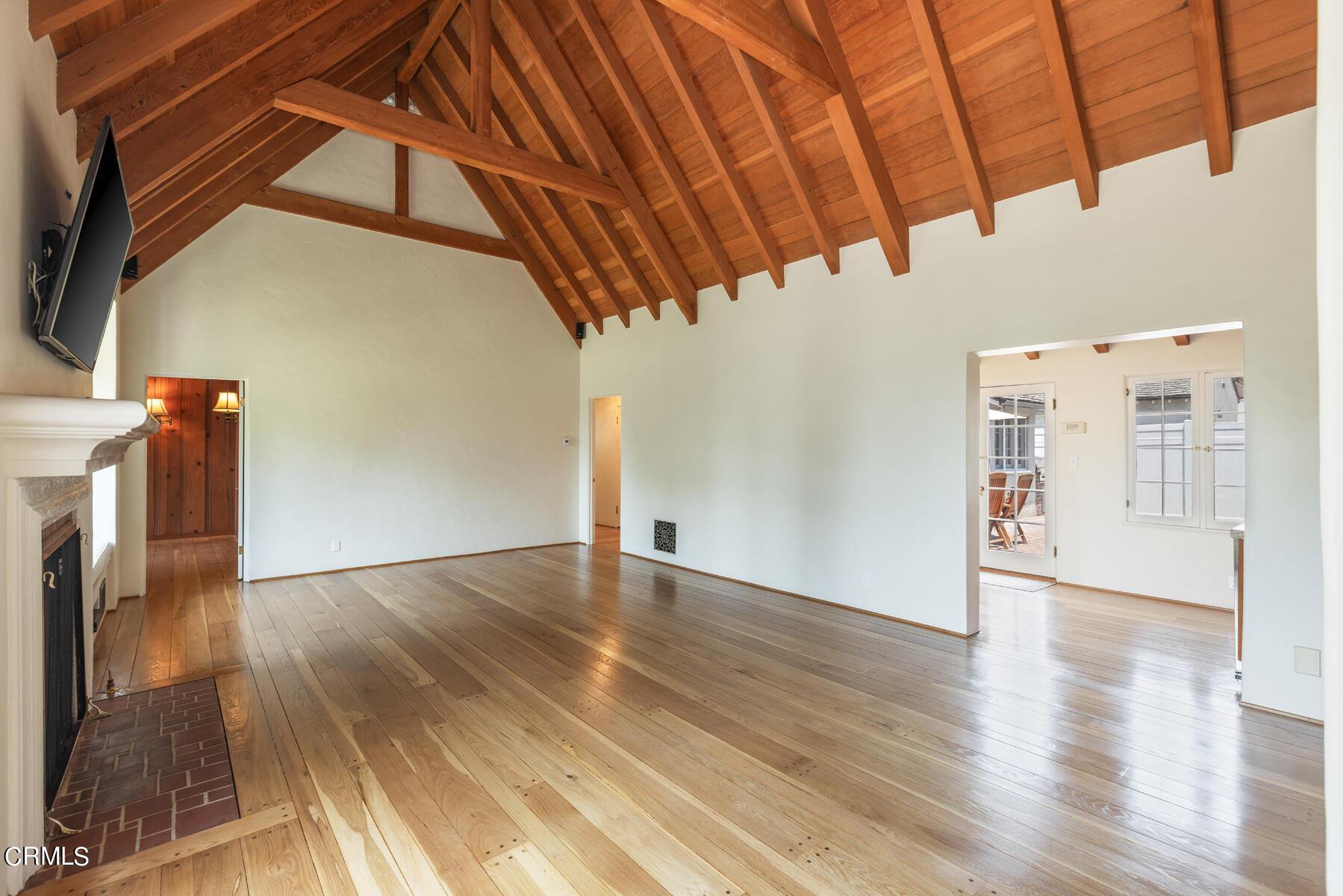 369 West Kenneth Road Glendale, CA 91202 - Photo 8 of 45 a view of an empty room with wooden floor