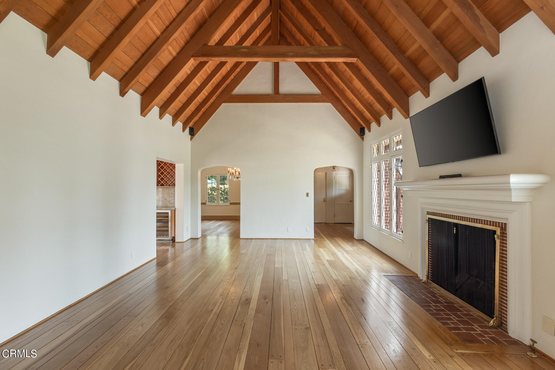 369 West Kenneth Road Glendale, CA 91202 - Photo 10 of 45 a view of empty room with fireplace and wooden floor