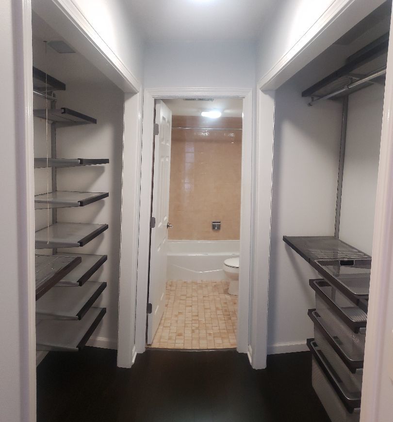 8350 West Addison Street, Unit 201 Chicago, IL 60634 - Photo 16 of 41 a bathroom with a glass door shower and a sink