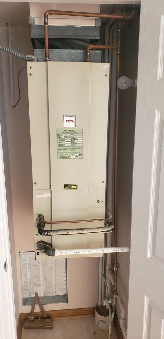 8350 West Addison Street, Unit 201 Chicago, IL 60634 - Photo 25 of 41 a bathroom with a bathtub and a sink