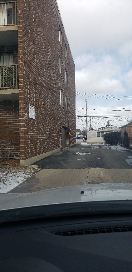 8350 West Addison Street, Unit 201 Chicago, IL 60634 - Photo 26 of 41 a cars parked on the side of a street