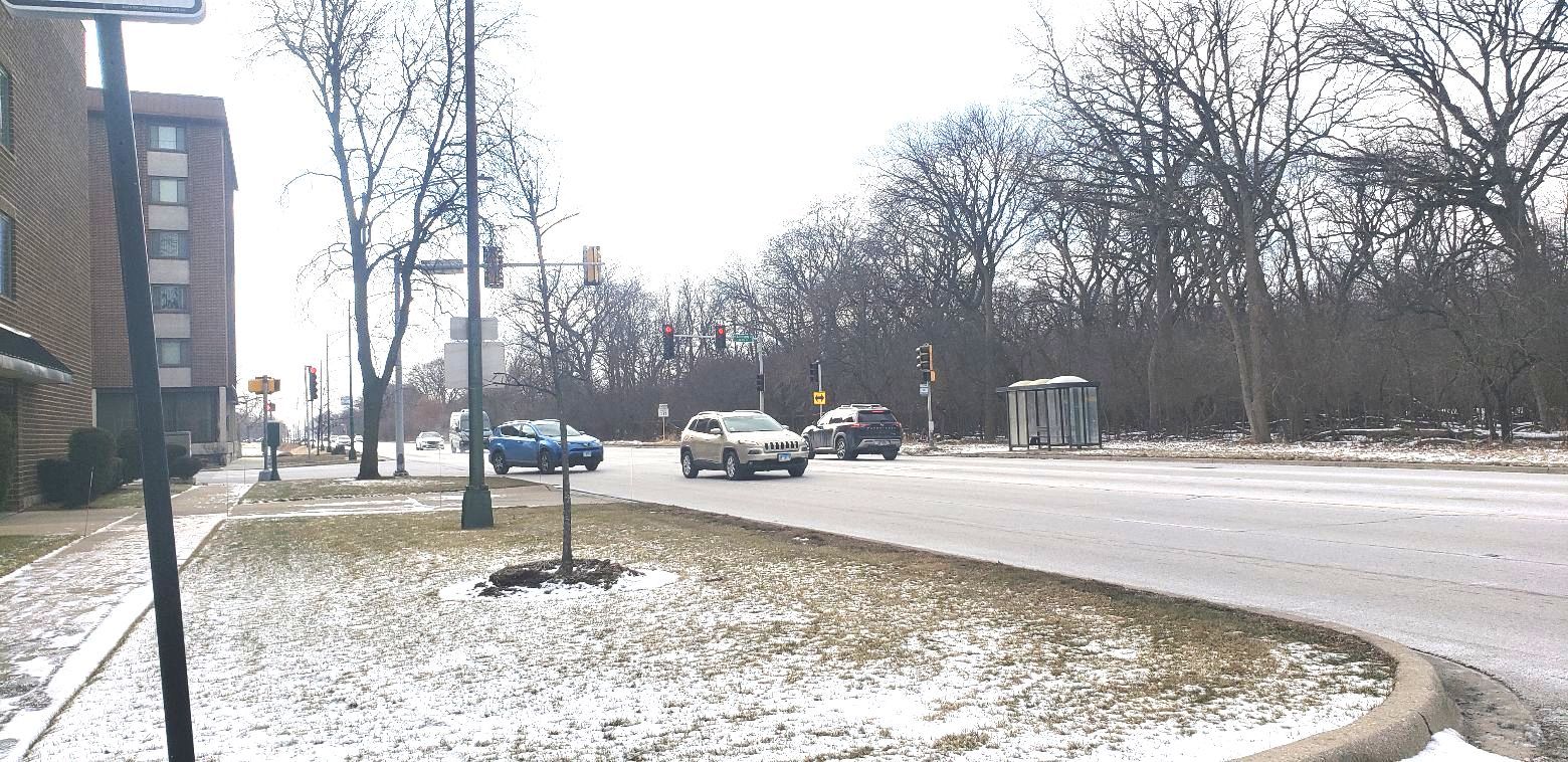 8350 West Addison Street, Unit 201 Chicago, IL 60634 - Photo 41 of 41 a backyard of a house with barbeque oven and outdoor seating