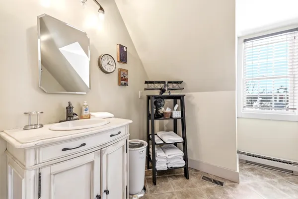 a utility room with a sink dryer and washer