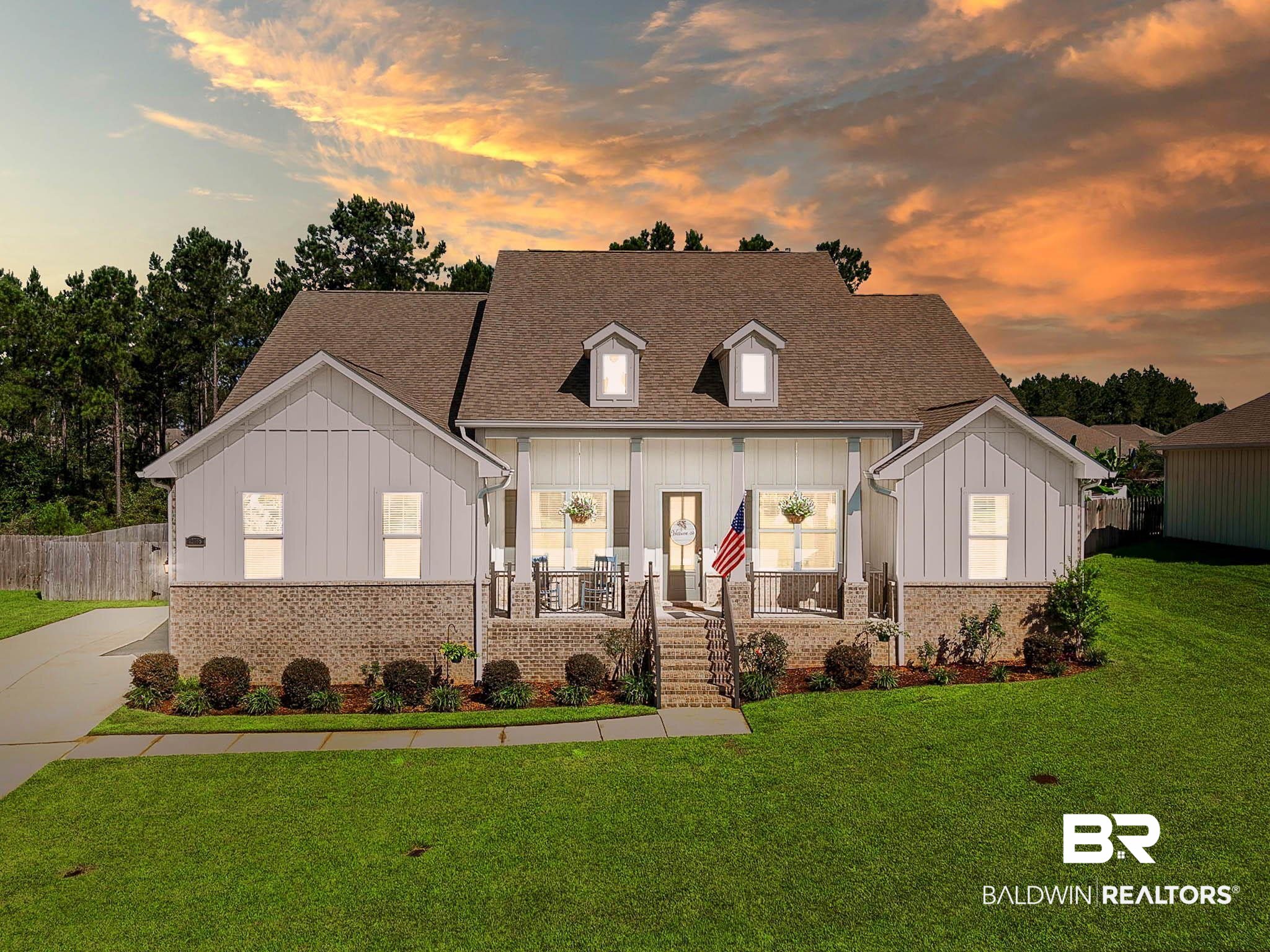 12785 Warbler Street Daphne, AL 36527 - Photo 1 of 53 View of front of home featuring board and batten siding, a porch, roof with shingles, and brick siding