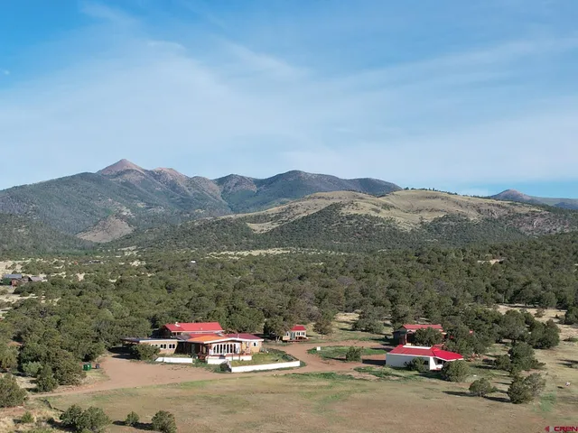 a view of car parked on the side of a road